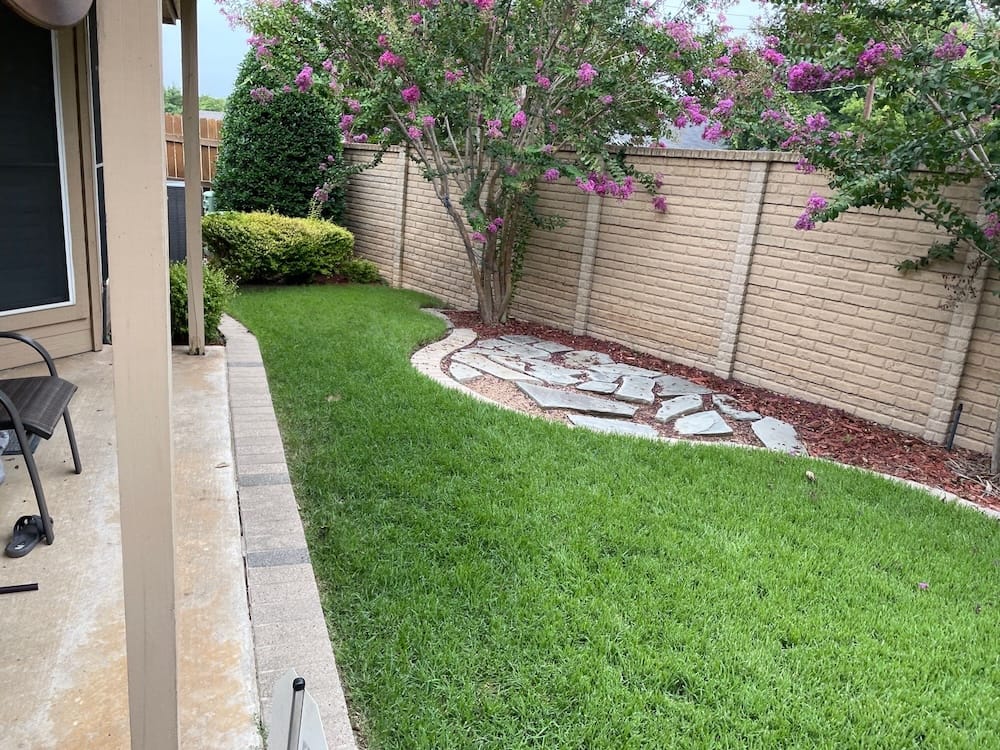 Professional lawn care services improving residential lawns.