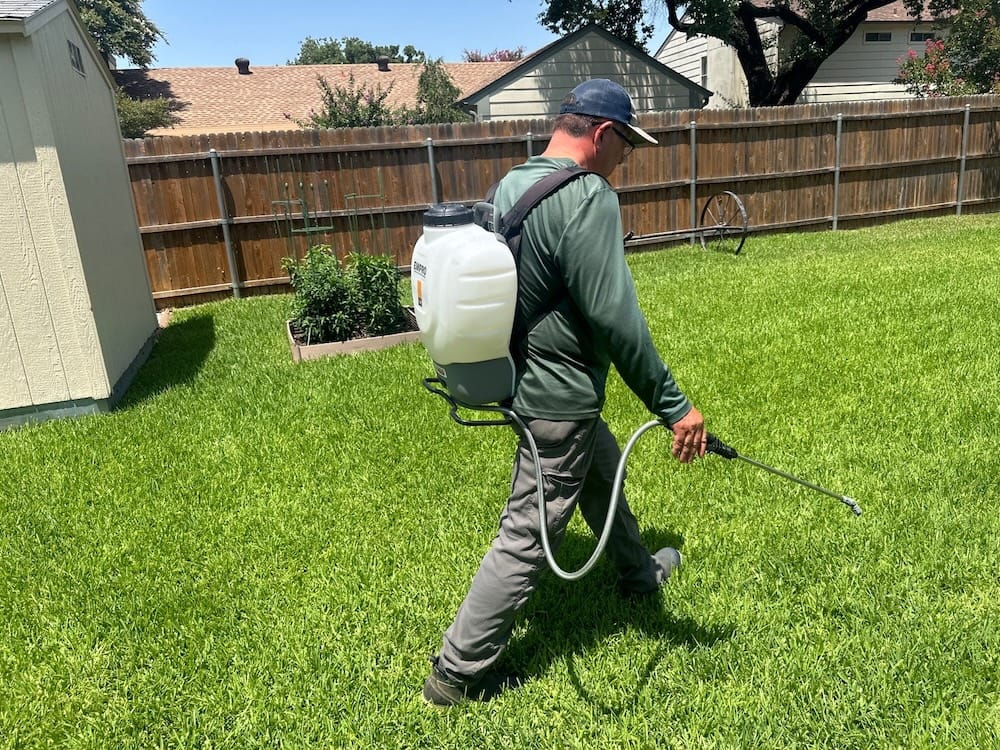 Professional lawn care targeting weeds and pests.